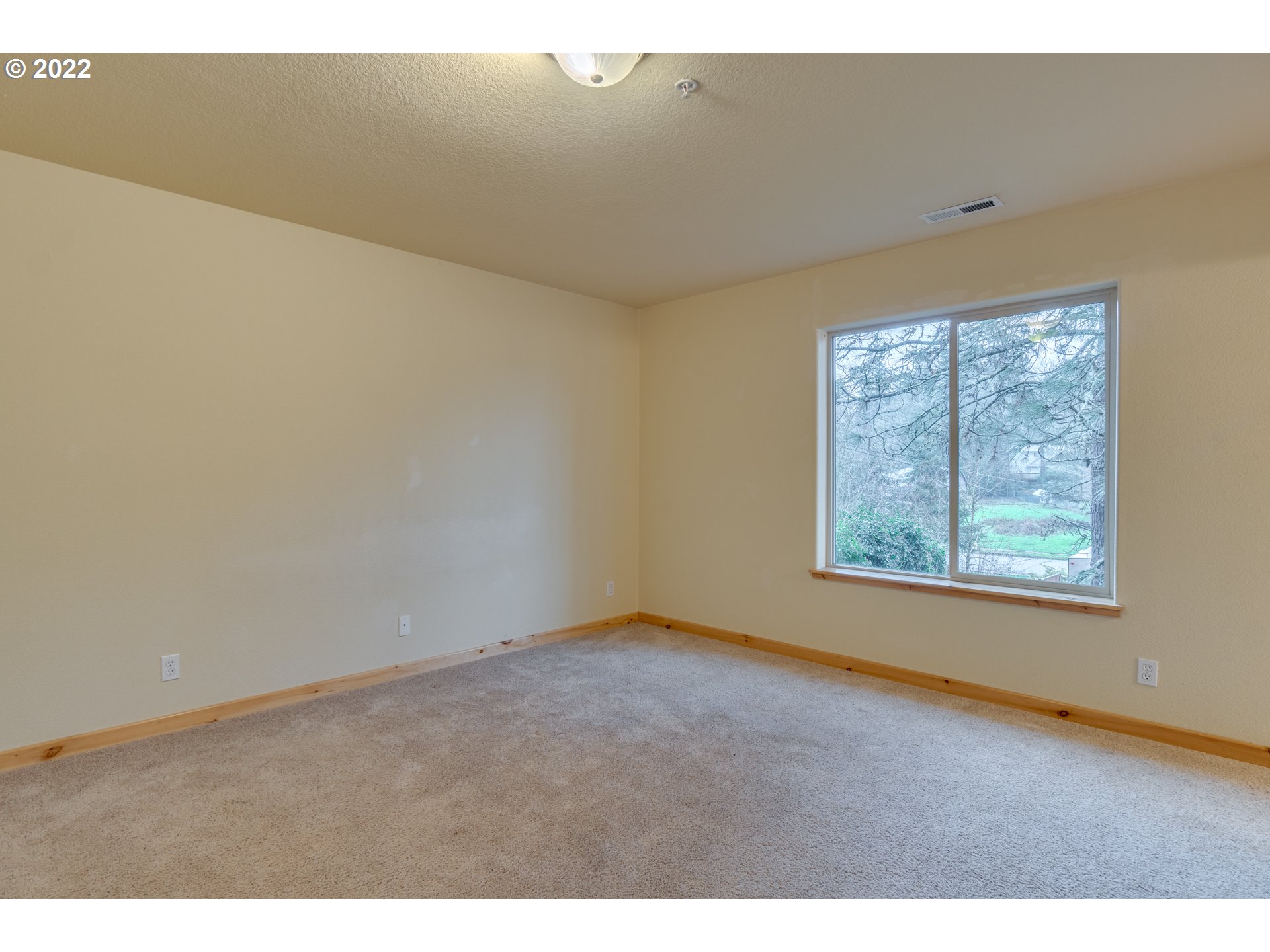 640 Southwest Trout Court Camas, WA 98607 - Photo 25 of 32 a view of an empty room with a window