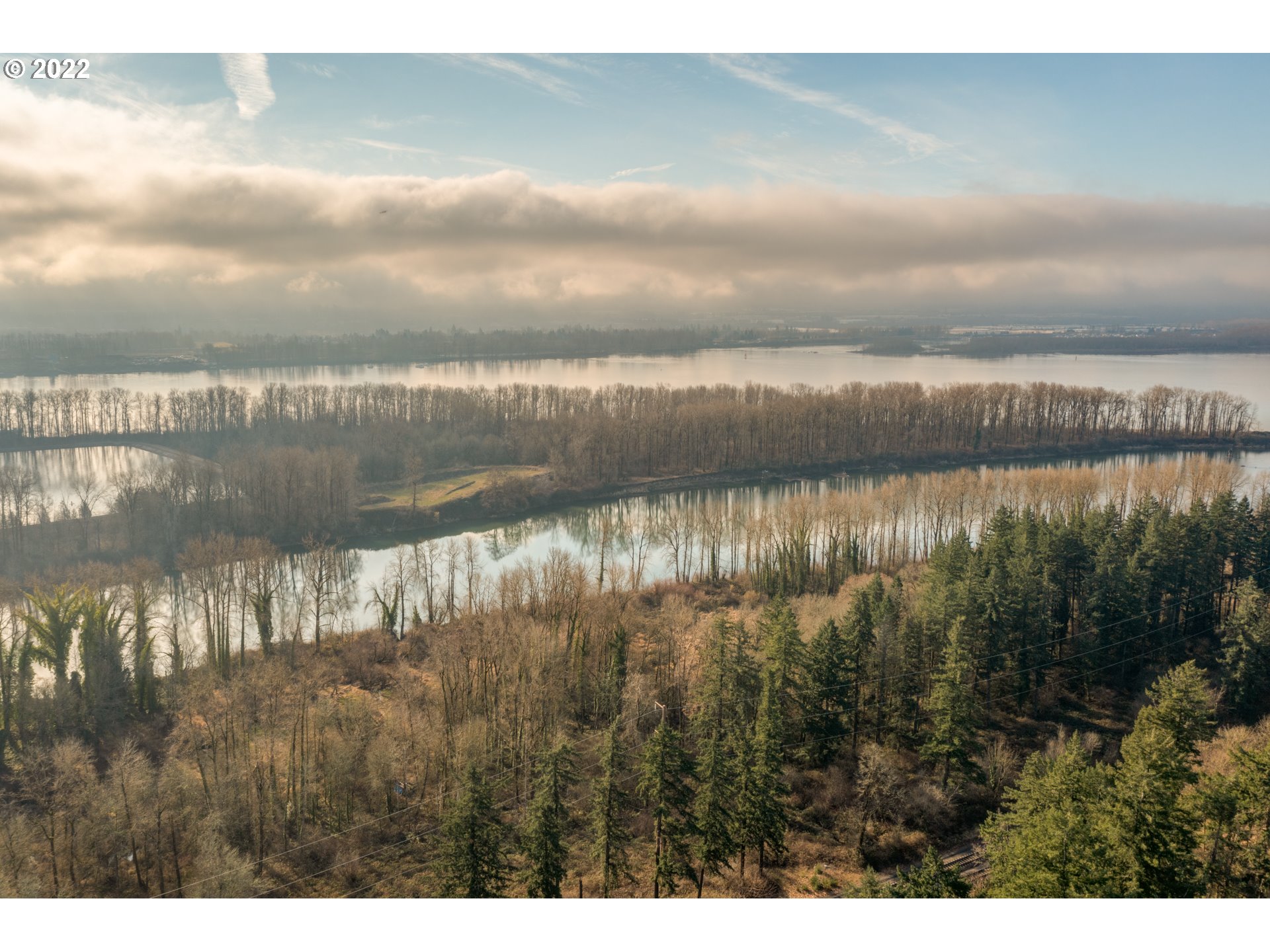 640 Southwest Trout Court Camas, WA 98607 - Photo 32 of 32 a view of a lake from a yard