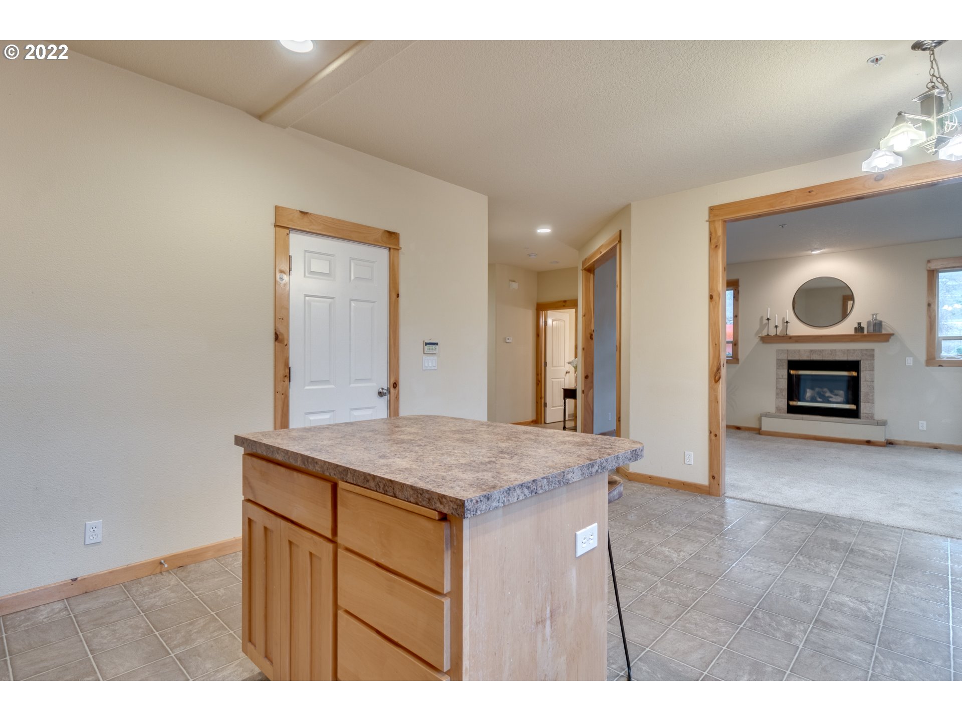 640 Southwest Trout Court Camas, WA 98607 - Photo 5 of 32 a room with a bed and a fireplace