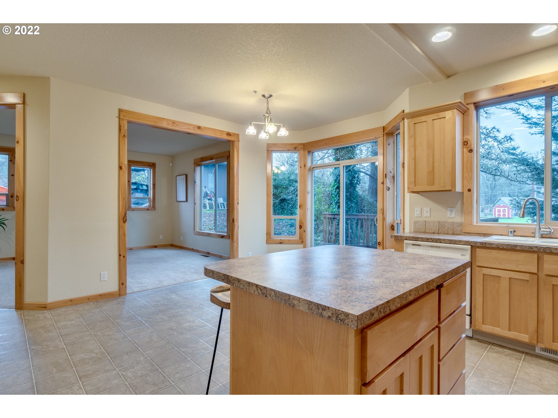 640 Southwest Trout Court Camas, WA 98607 - Photo 8 of 32 a view living room with granite countertop furniture and a kitchen view