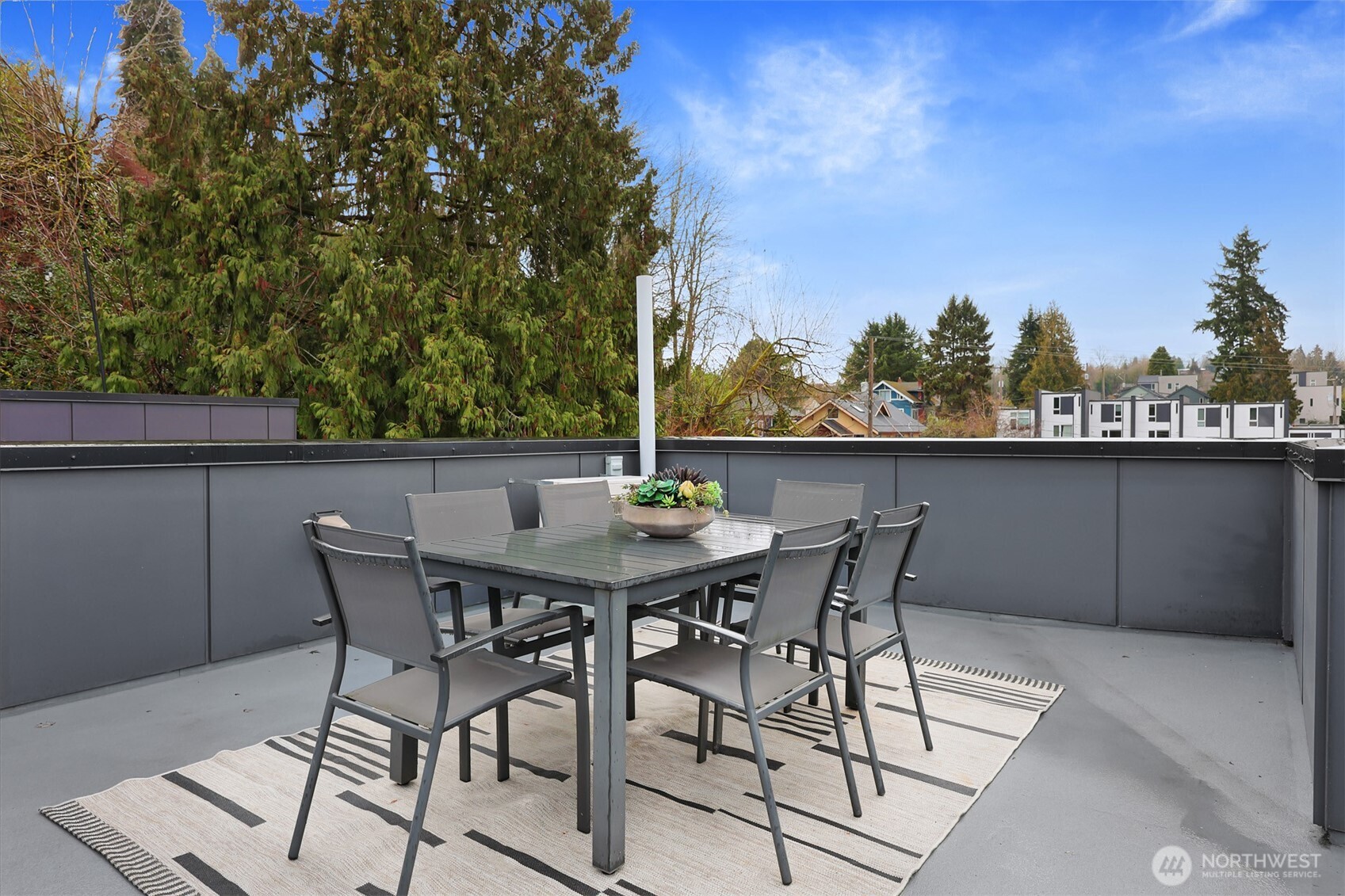 3717 South Dawson Street Seattle, WA 98118 - Photo 28 of 40 a view of a terrace with furniture and trees