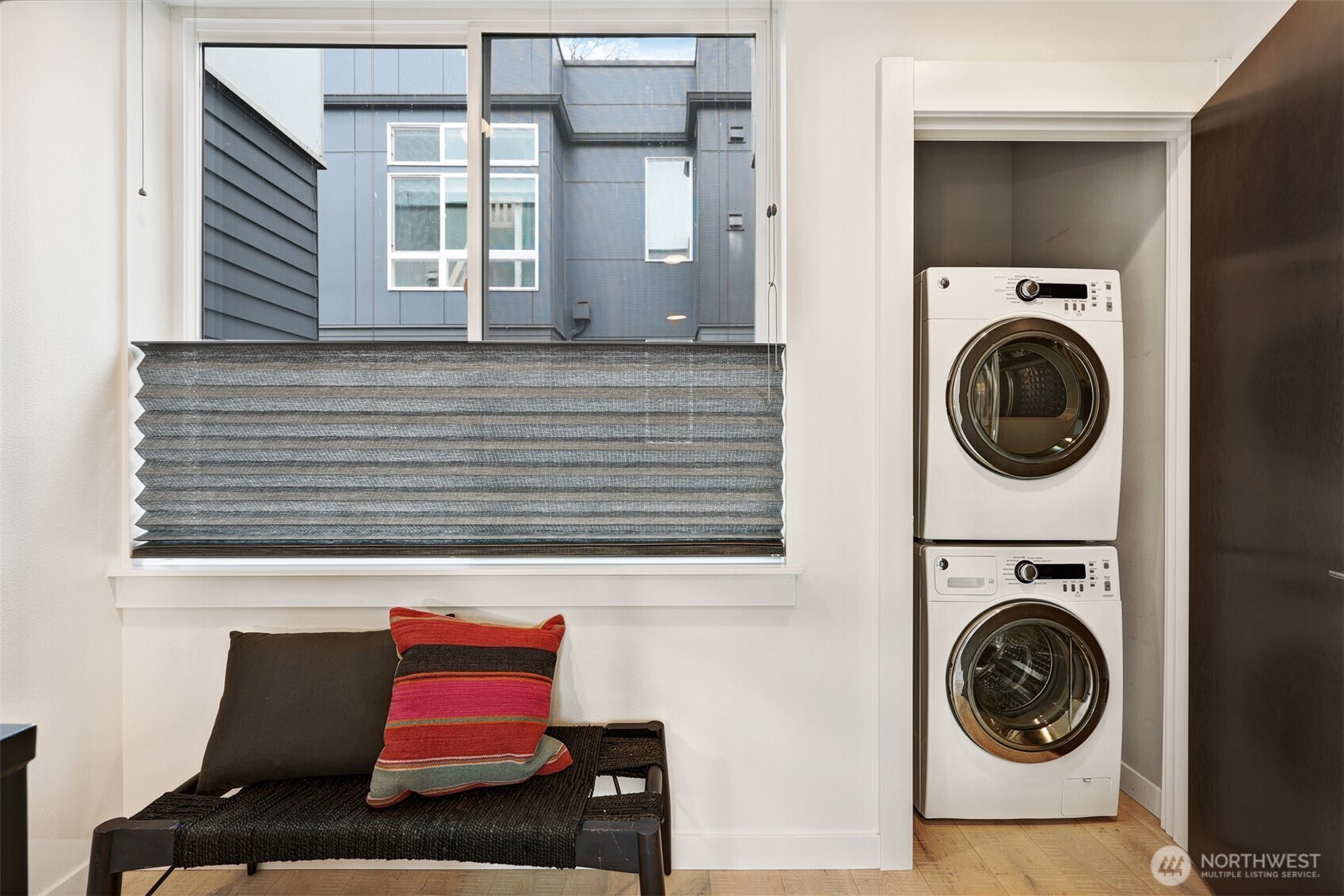 3717 South Dawson Street Seattle, WA 98118 - Photo 3 of 40 a view of a bedroom with washer and dryer