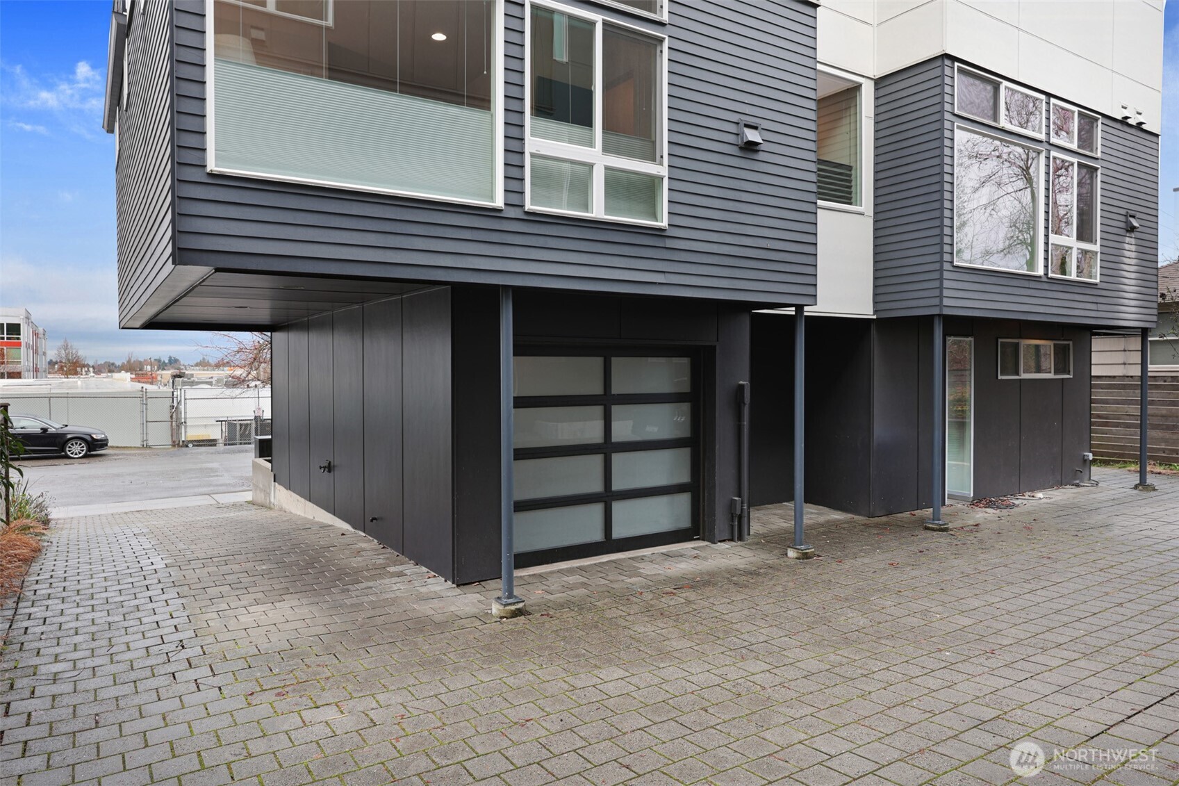 3717 South Dawson Street Seattle, WA 98118 - Photo 35 of 40 a view of a house with a large window and stairs