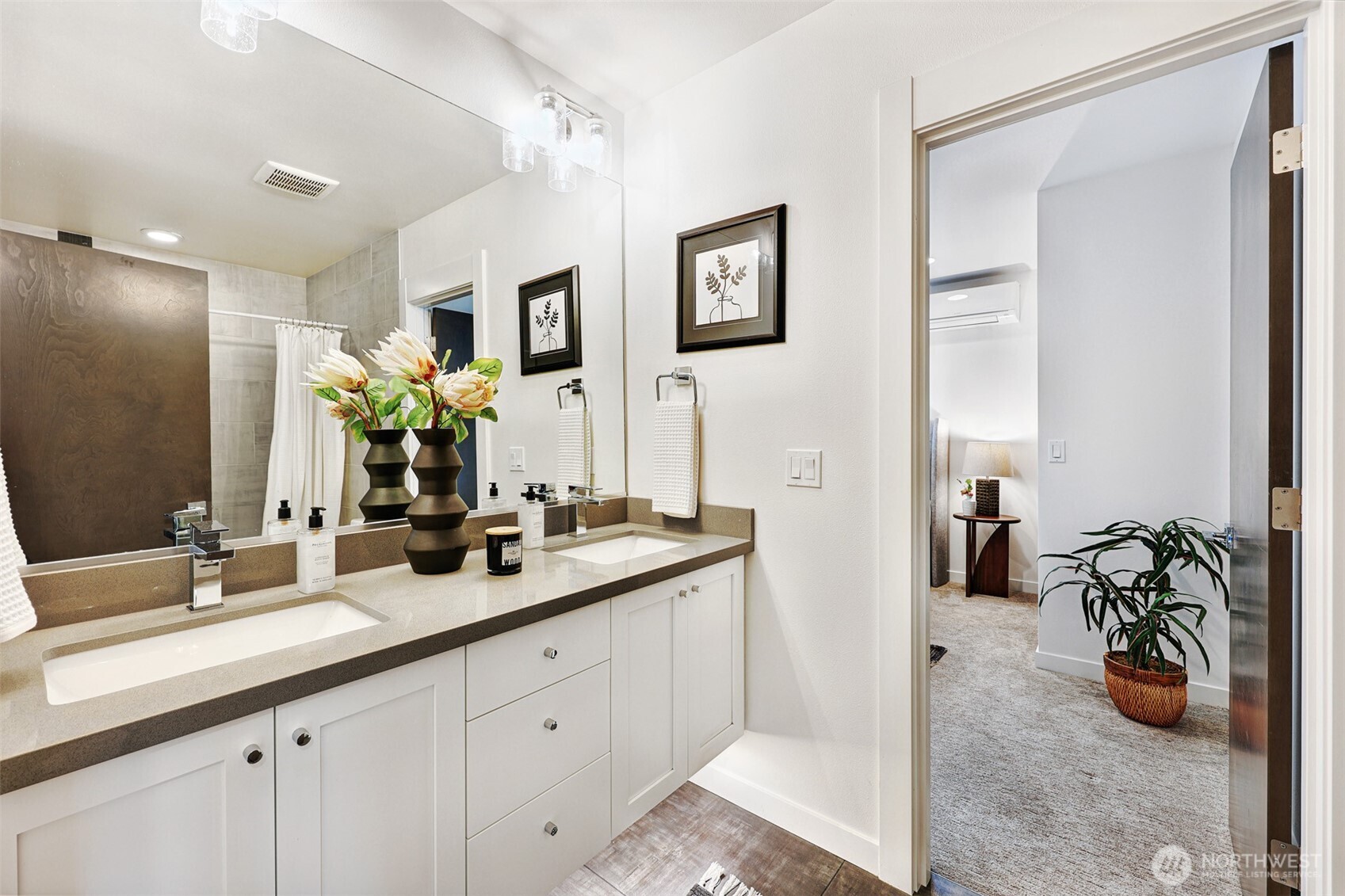 3717 South Dawson Street Seattle, WA 98118 - Photo 7 of 40 a bathroom with a double vanity sink and a mirror
