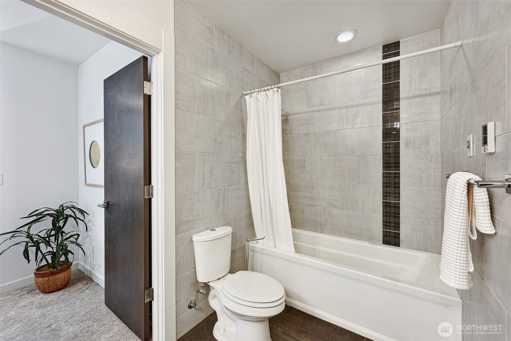 3717 South Dawson Street Seattle, WA 98118 - Photo 8 of 40 a bathroom with a shower and a toilet