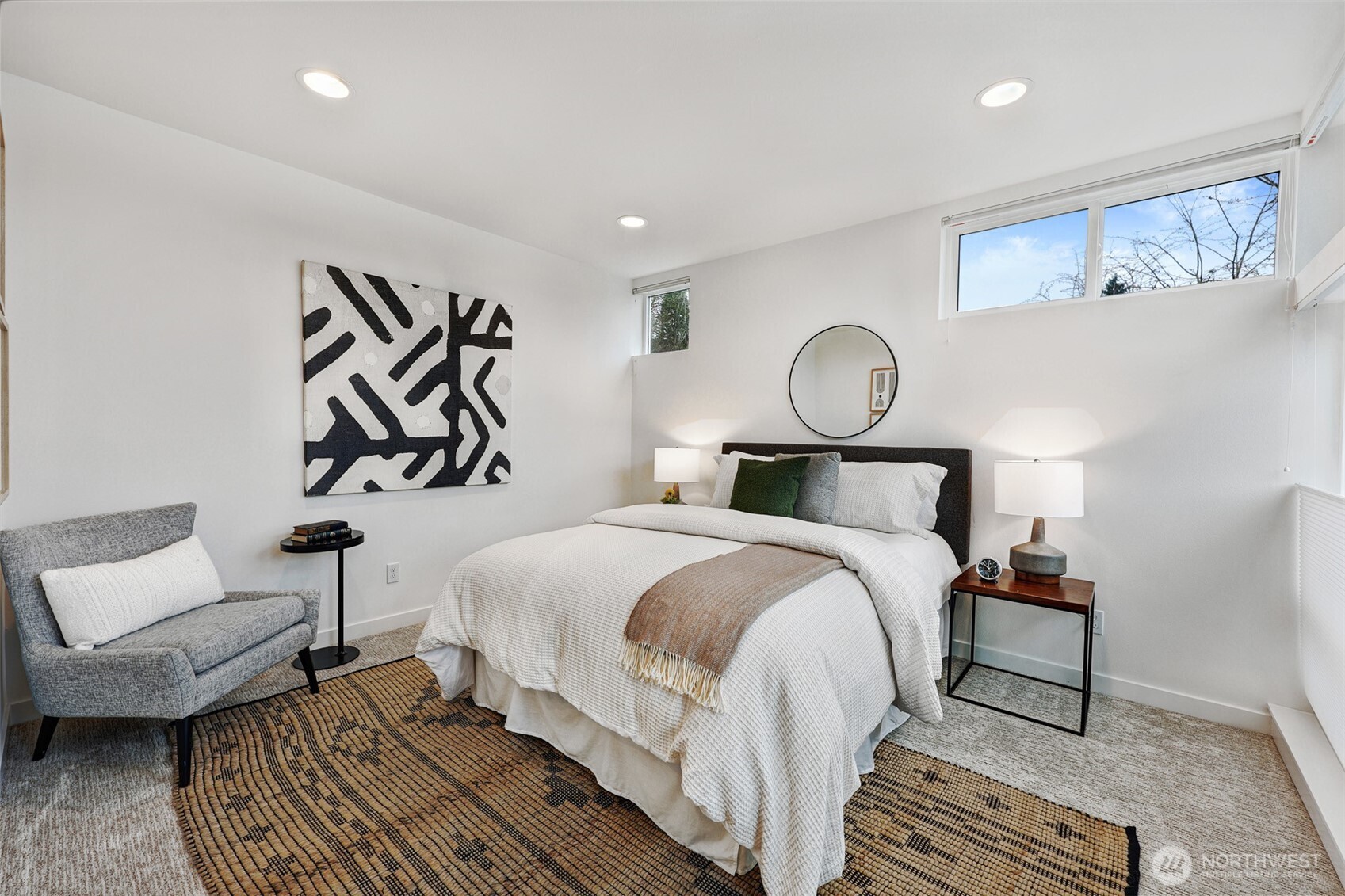 3717 South Dawson Street Seattle, WA 98118 - Photo 10 of 40 a bedroom with a bed and wooden floor