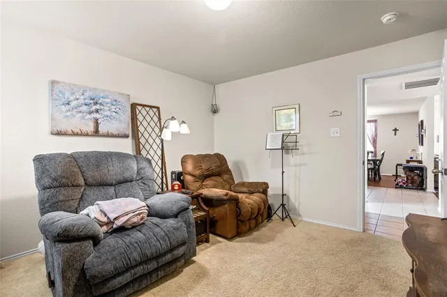 a living room with furniture and a couch
