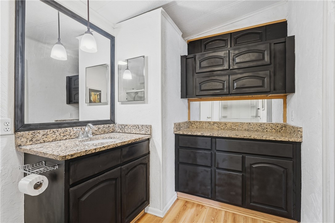 566 Dolphin Circle Sebastian, FL 32976 - Photo 15 of 36 a bathroom with a sink a vanity and a mirror