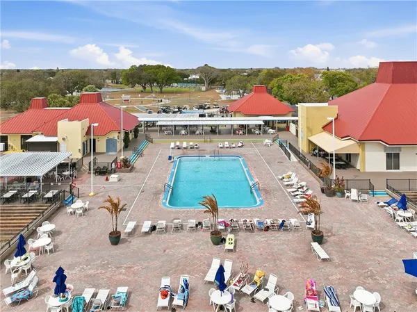 an aerial view of residential houses and outdoor space