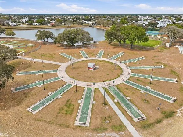 an aerial view of a house with a ocean view
