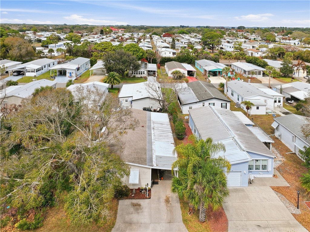 566 Dolphin Circle Sebastian, FL 32976 - Photo 27 of 36 an aerial view of residential houses with outdoor space
