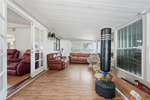a living room with furniture or couch and a table