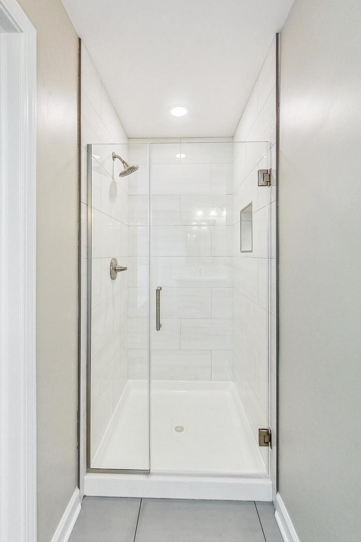 2782 Moraine Valley Road Wauconda, IL 60084 - Photo 12 of 24 a bathroom with a shower