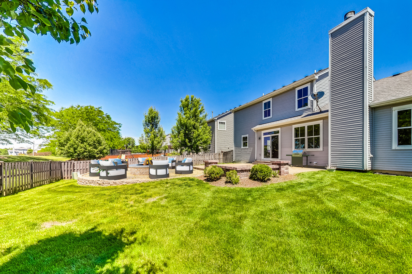 2782 Moraine Valley Road Wauconda, IL 60084 - Photo 2 of 24 a view of a house with backyard porch and sitting area
