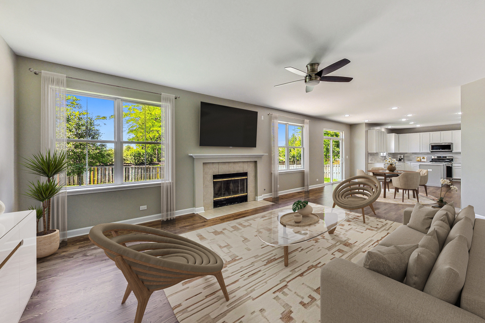 2782 Moraine Valley Road Wauconda, IL 60084 - Photo 7 of 24 a living room with furniture a fireplace and a flat screen tv