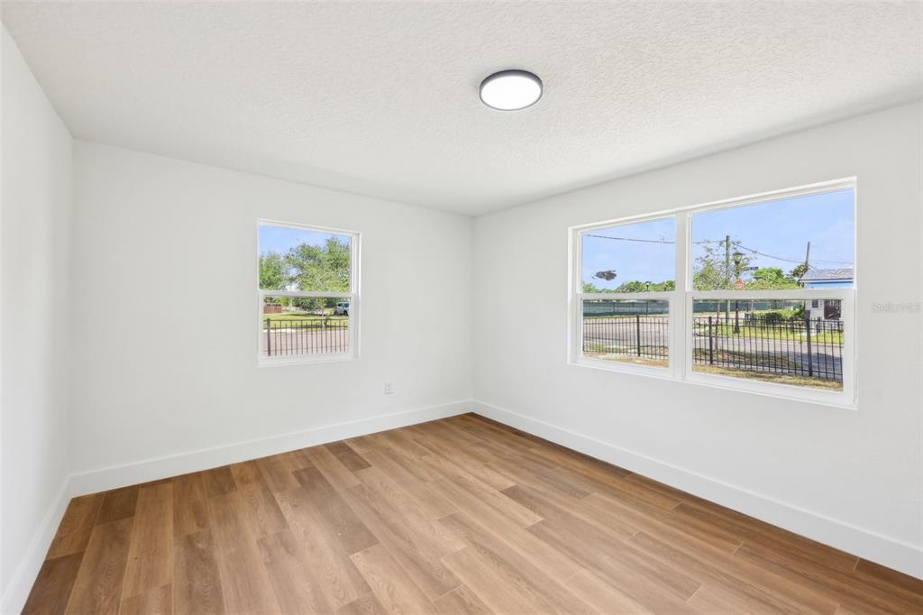 730 West Swoope Avenue Winter Park, FL 32789 - Photo 24 of 72 wooden floor in an empty room with a window
