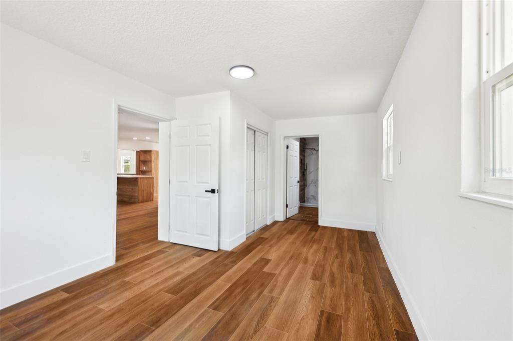 730 West Swoope Avenue Winter Park, FL 32789 - Photo 34 of 72 a view of a room with wooden floor and staircase