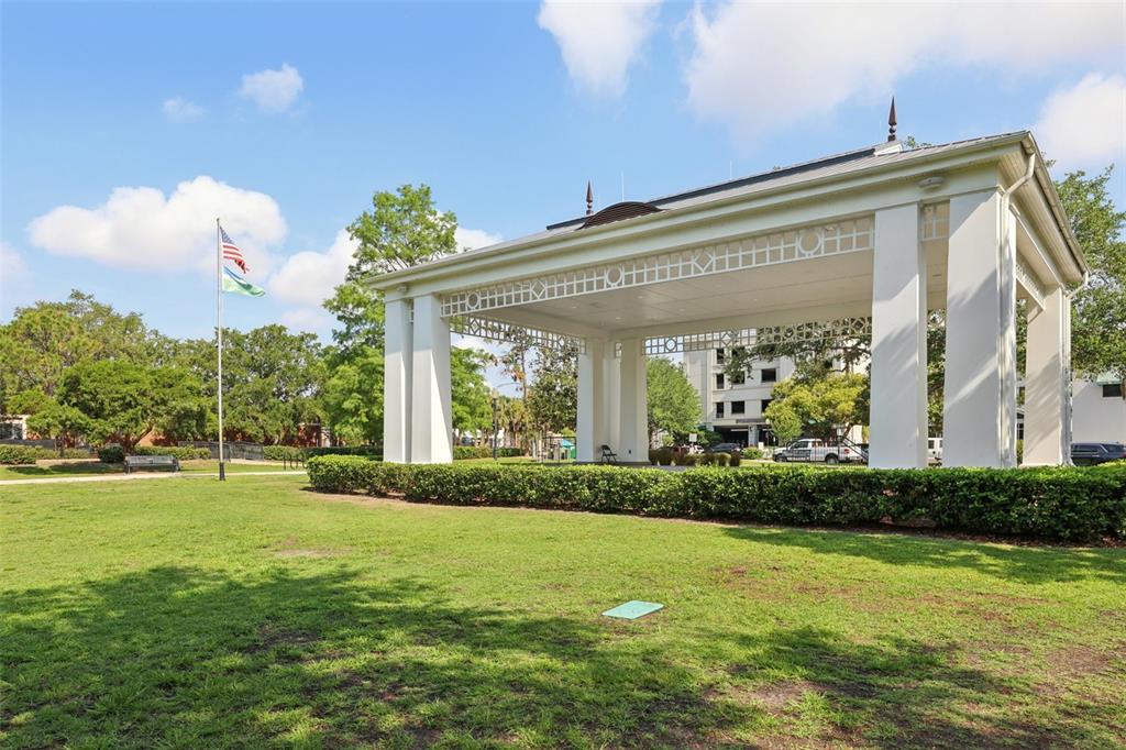 730 West Swoope Avenue Winter Park, FL 32789 - Photo 71 of 72 a view of a house with a big yard and potted plants