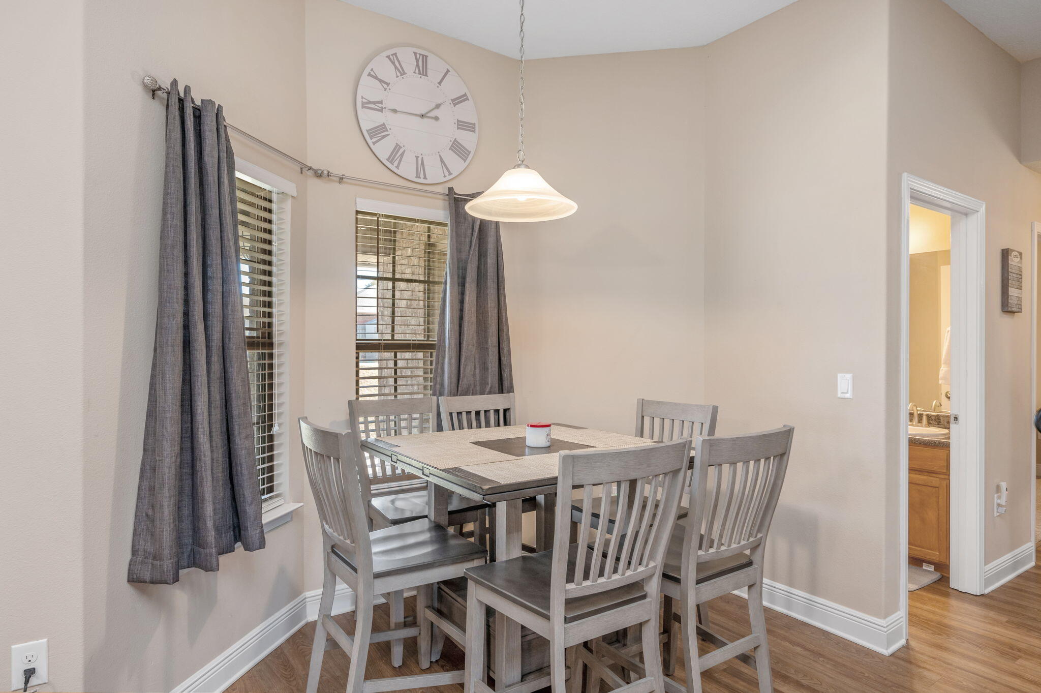 2342 Genevieve Way Crestview, FL 32536 - Photo 14 of 41 a view of a dining room with furniture window and wooden floor