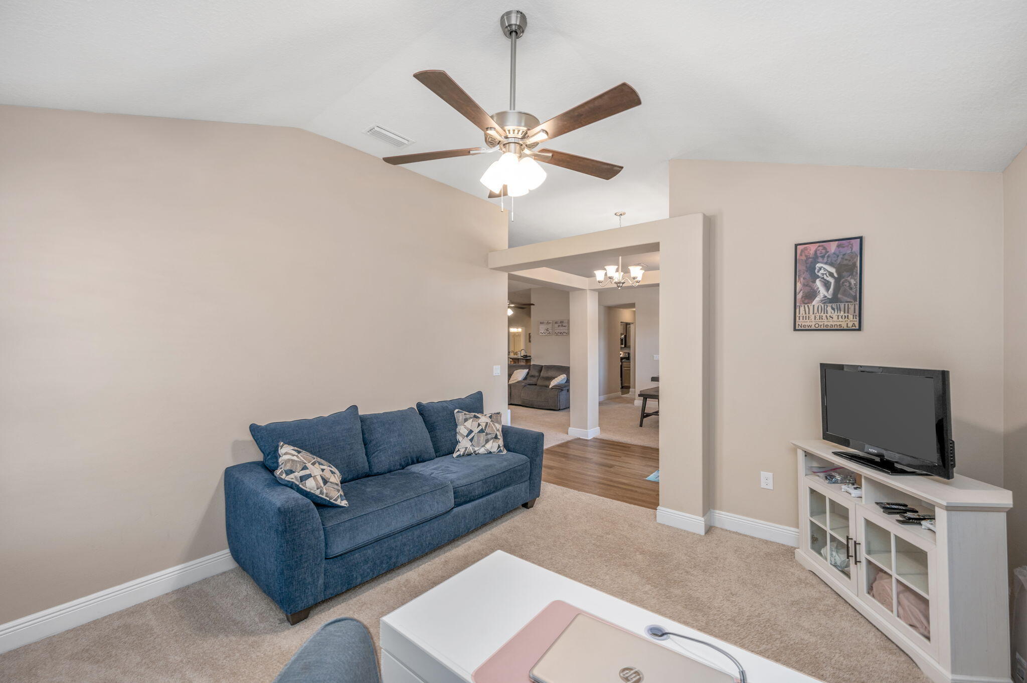 2342 Genevieve Way Crestview, FL 32536 - Photo 15 of 41 a living room with furniture and a flat screen tv
