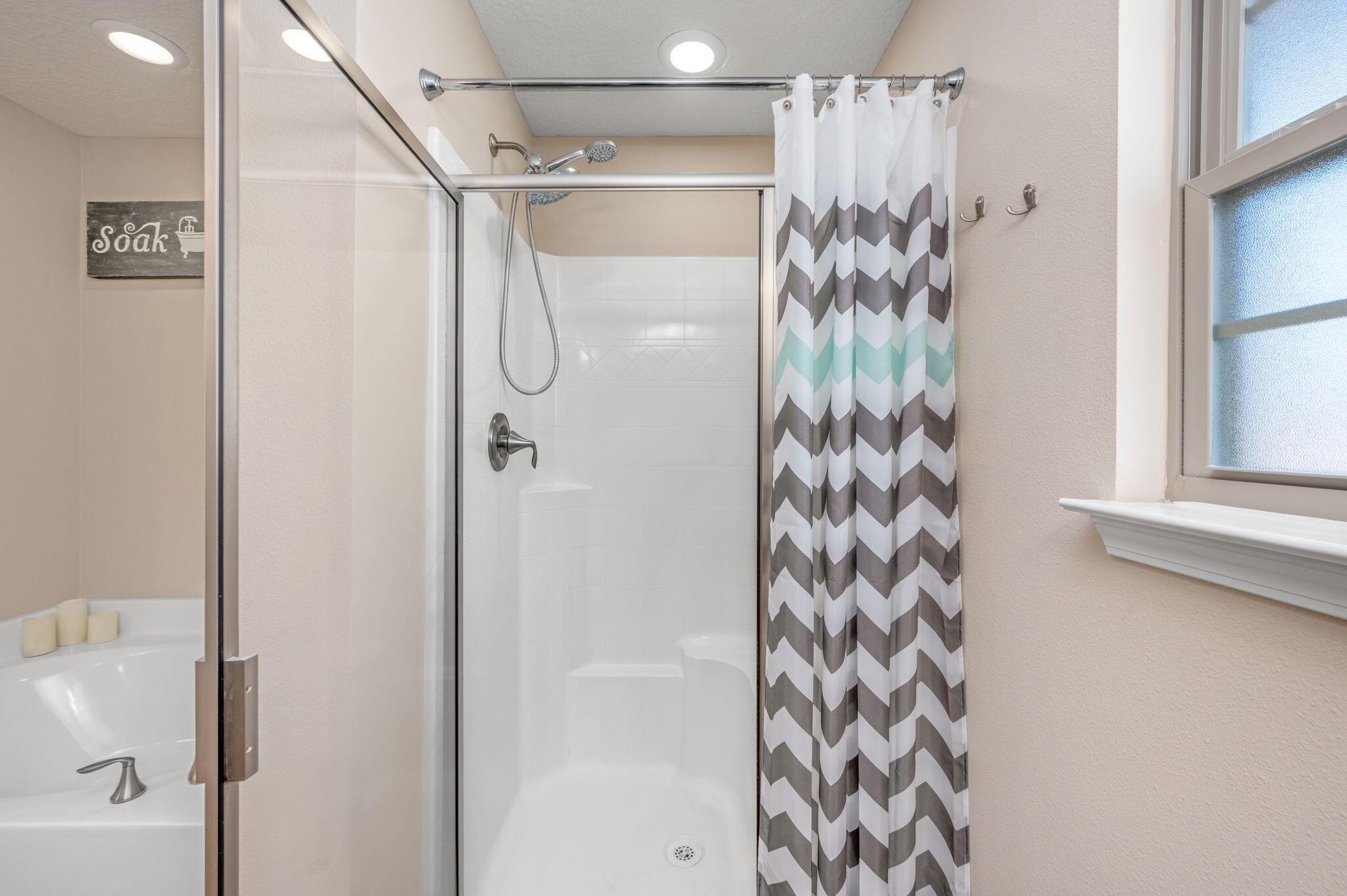 2342 Genevieve Way Crestview, FL 32536 - Photo 32 of 41 a bathroom with a shower and a glass door