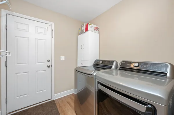 a view of a swimming pool with a lounge chair