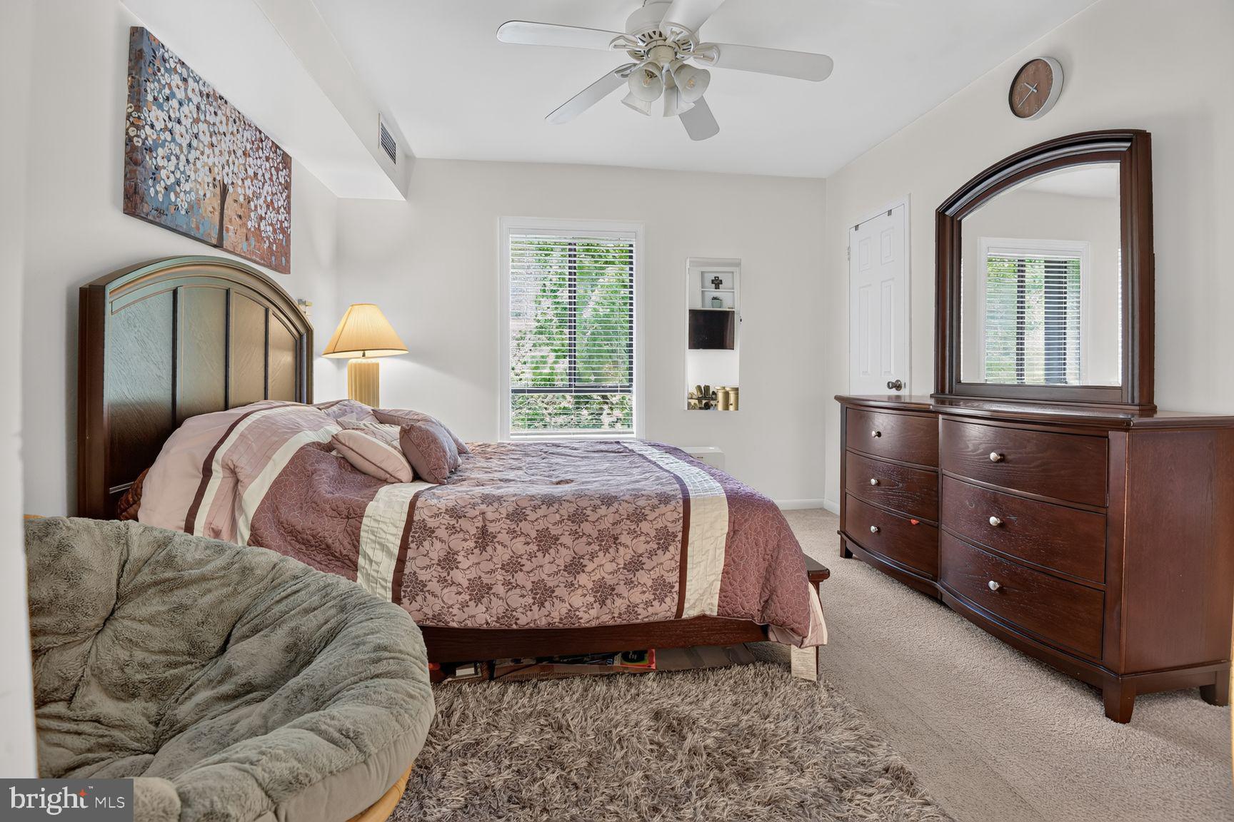 11645 Stoneview Square, Unit 21C Reston, VA 20191 - Photo 8 of 12 Serene bedroom with natural light.