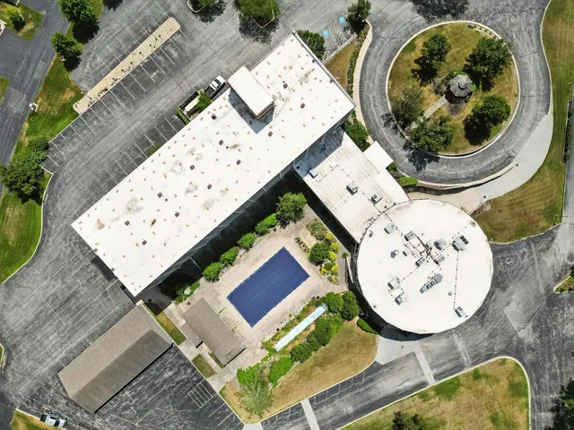 an aerial view of a house having garden