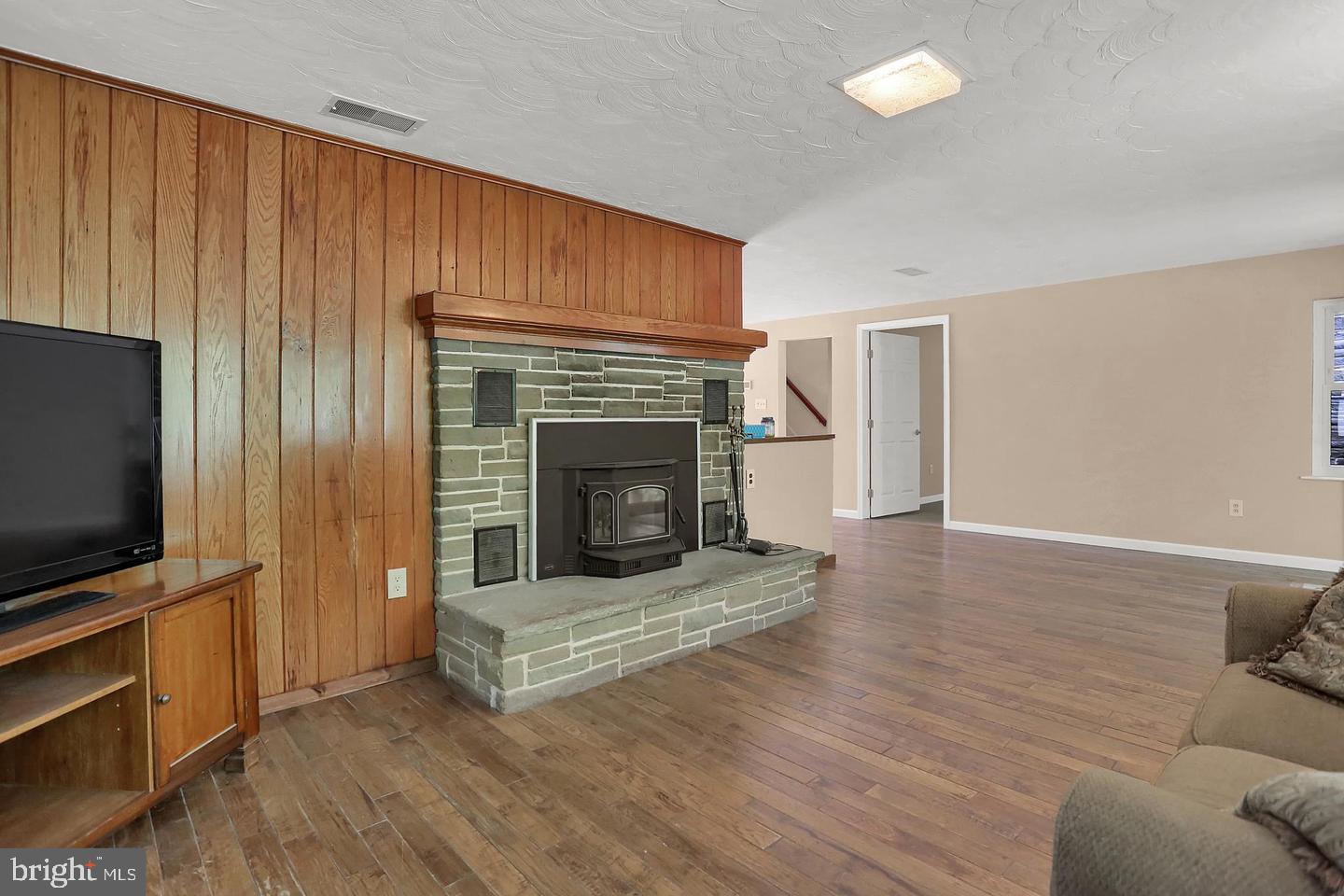 175 Pickett Road Dover, PA 17315 - Photo 7 of 36 Cozy living space with rustic charm.
