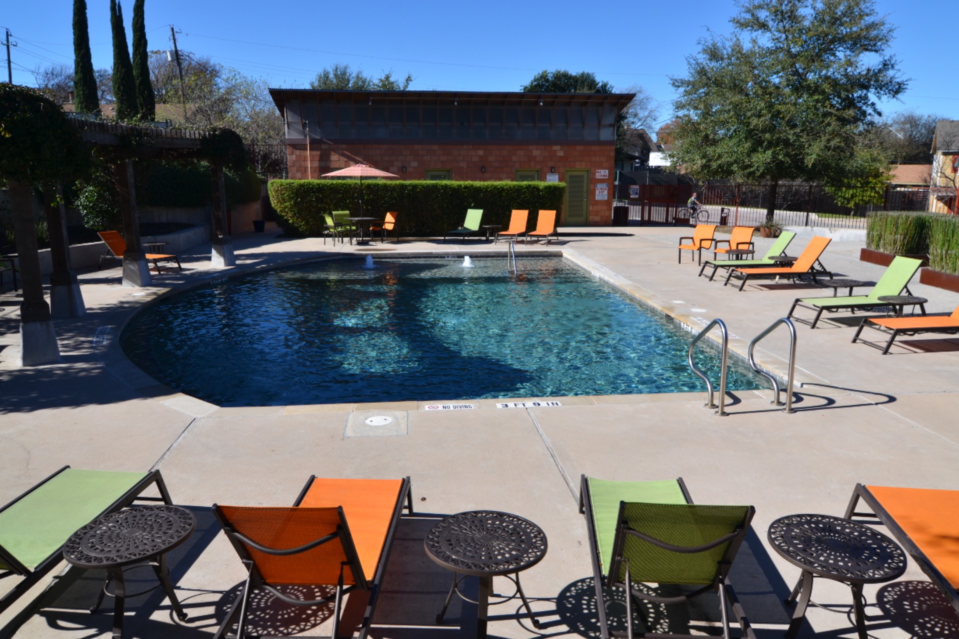 1916 Cleese Drive Austin, TX 78741 - Photo 32 of 36 An inviting pool area offers a refreshing oasis with ample lounge seating for relaxation.