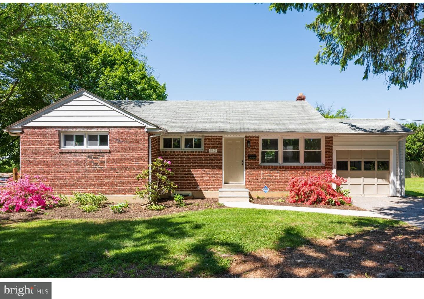 150 South Cedar Hollow Road Paoli, PA 19301 - Photo 2 of 23 a front view of a house with garden