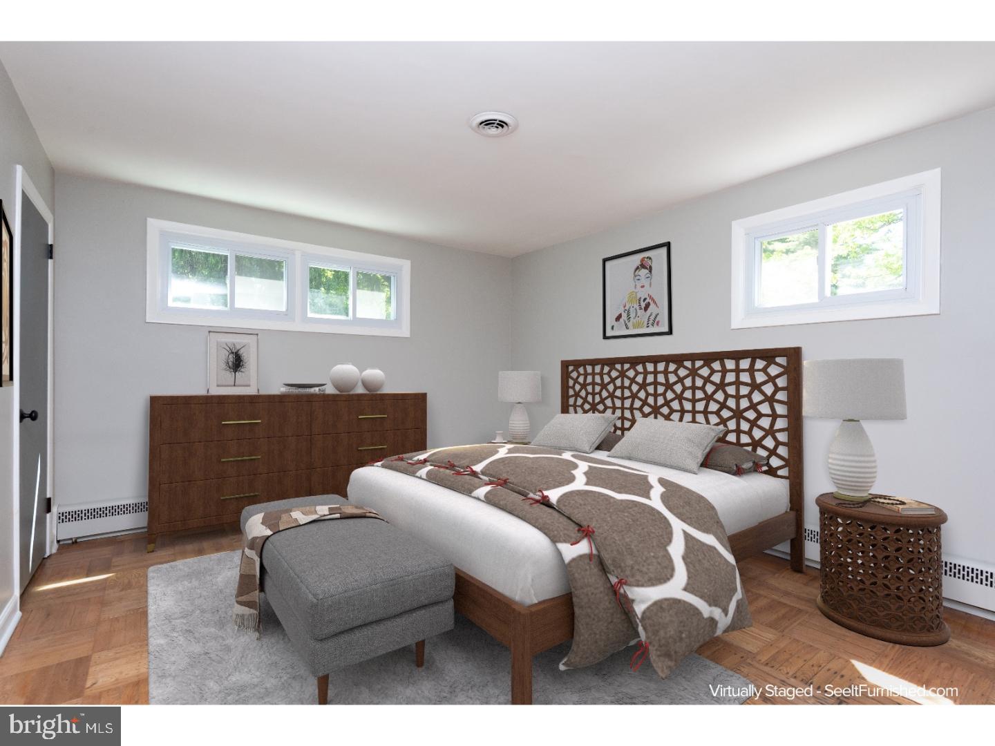 150 South Cedar Hollow Road Paoli, PA 19301 - Photo 15 of 23 a bedroom with bed couch and window