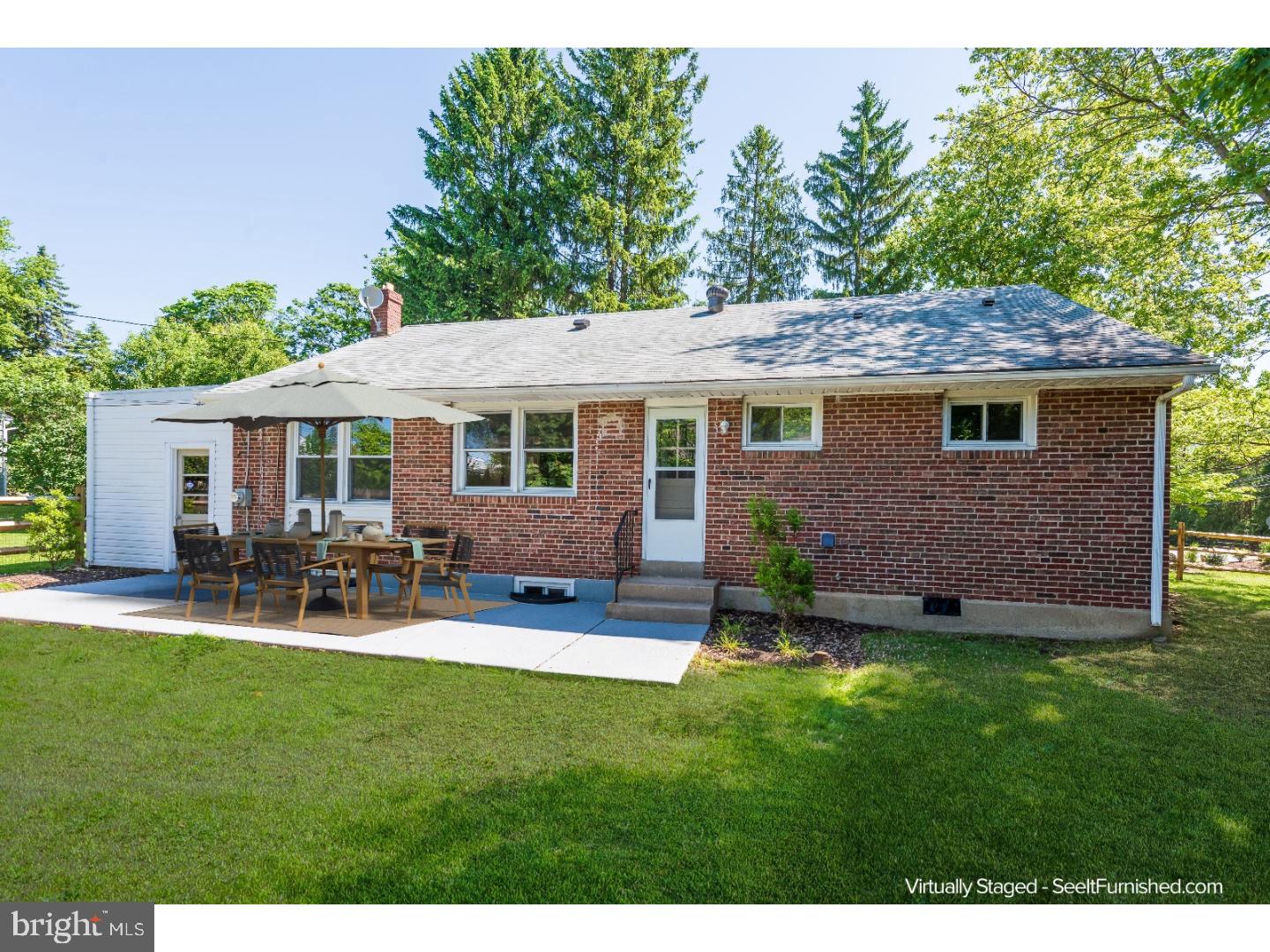 150 South Cedar Hollow Road Paoli, PA 19301 - Photo 20 of 23 a view of a house with a yard and sitting area