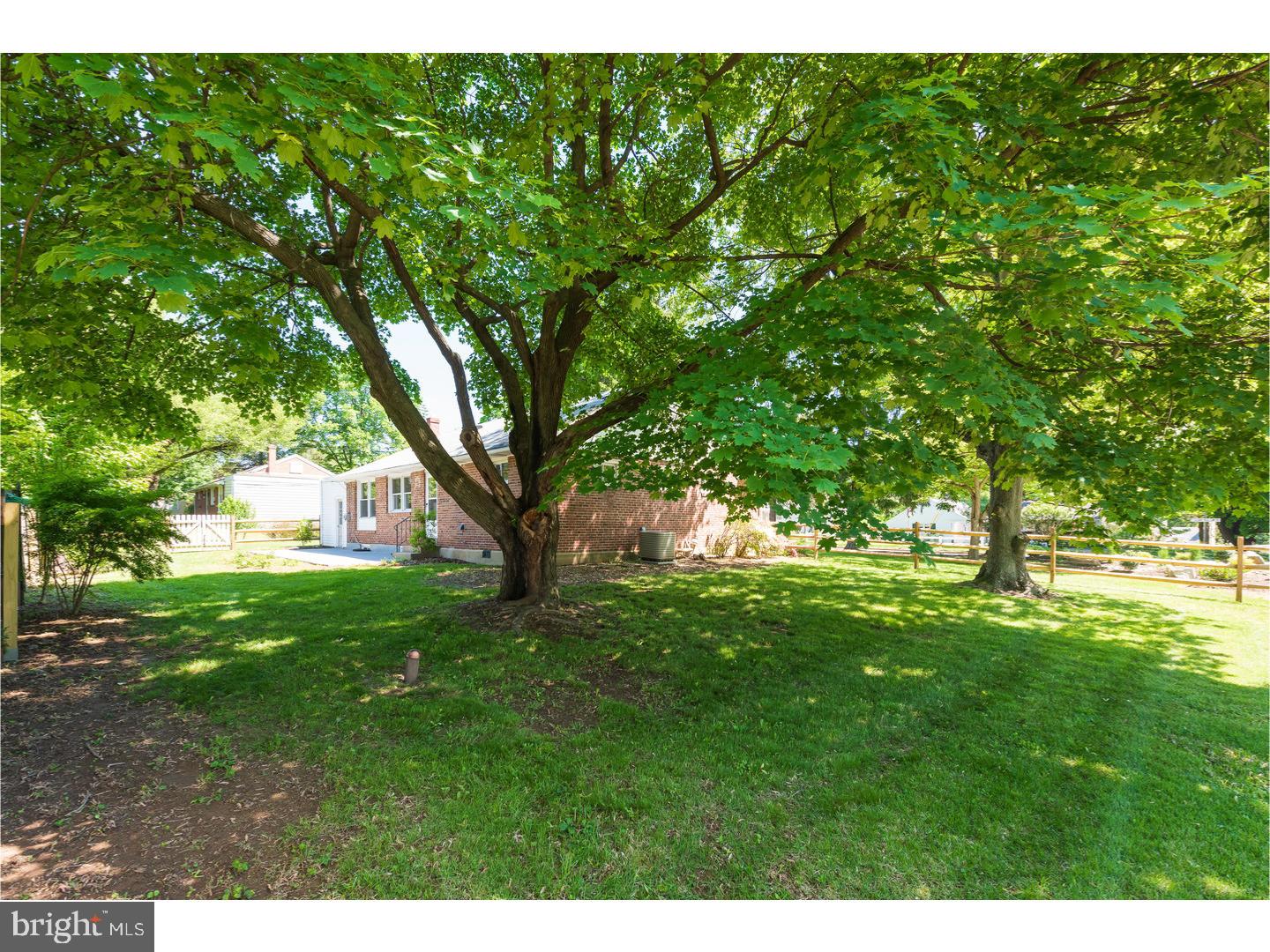 150 South Cedar Hollow Road Paoli, PA 19301 - Photo 23 of 23 a backyard of a house with lots of green space