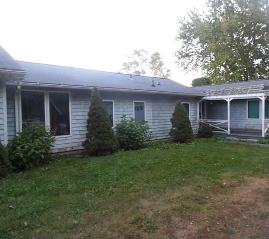96 Todd Hill Road Bethlehem, CT 06751 - Photo 1 of 1 a front view of a house with a garden
