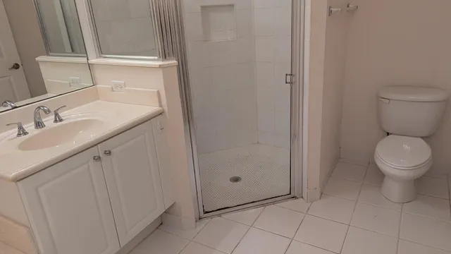 a bathroom with a sink toilet and vanity