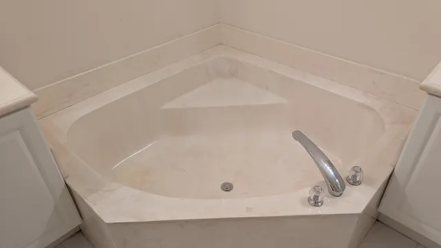 a bathroom with a white bath tub