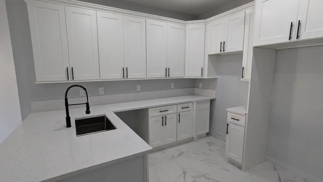 a view of a pathway with a house in the background