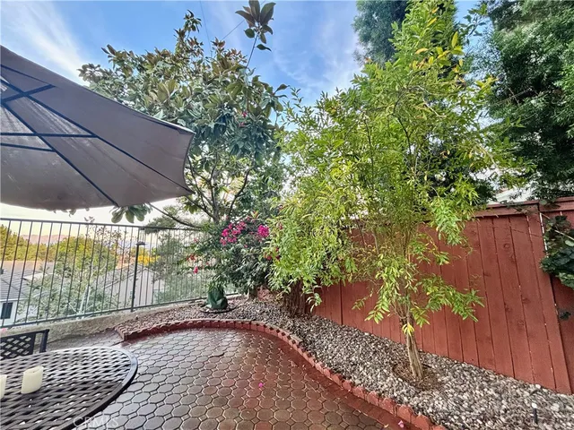 a view of a backyard with an outdoor space