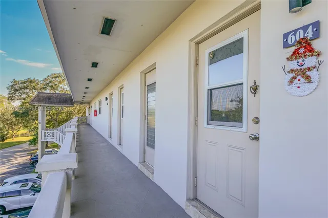 a view of entryway with furniture and garden