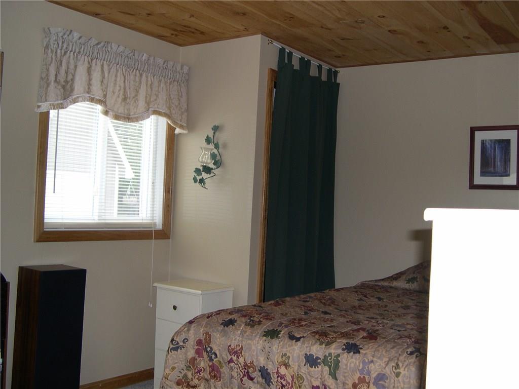 154 Wilsons Mill Road Oquossoc, ME 04964 - Photo 16 of 31 master bedroom