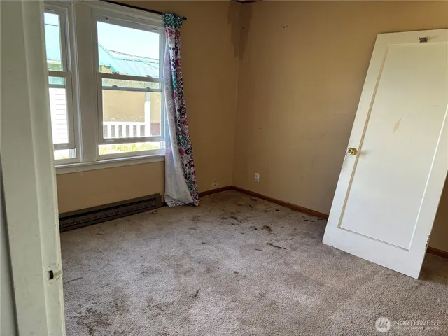 an empty room with a window