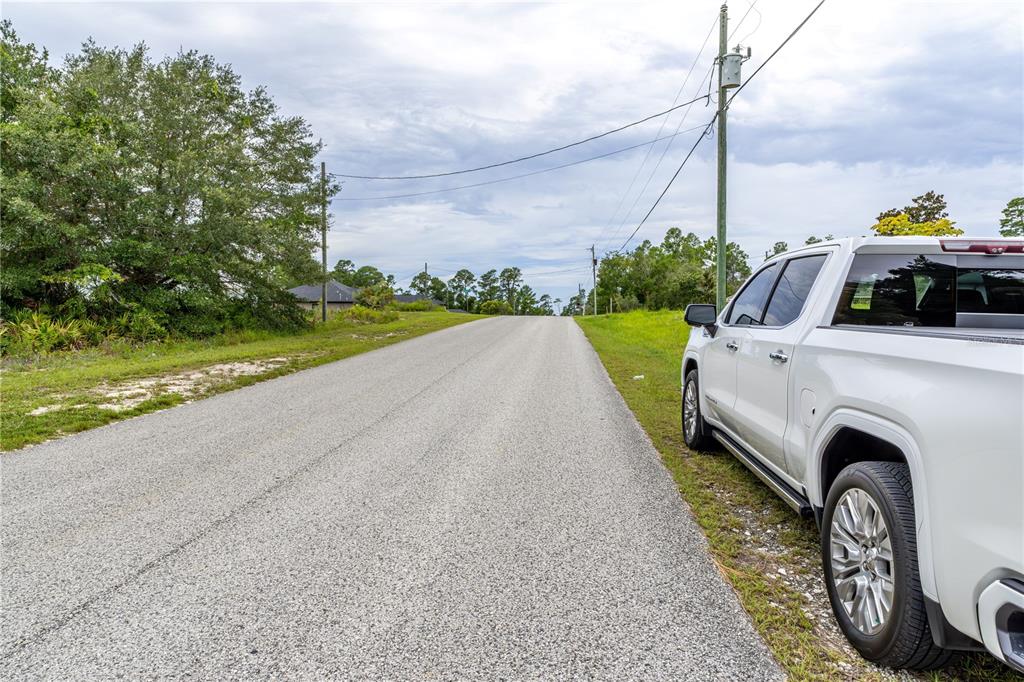0 Bahama Swallow Avenue, Unit 9 Weeki Wachee, FL 34613 - Photo 7 of 18 a view of a backyard with couches