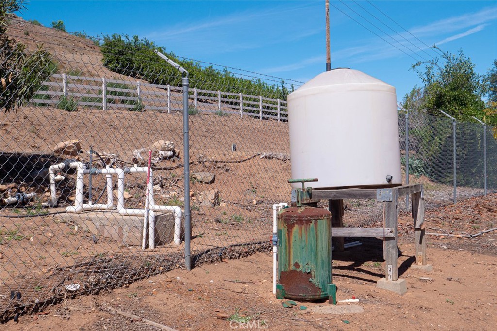 14 Carancho Road Temecula, CA 92590 - Photo 9 of 12 a front view of a house with garden