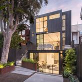 a view of a building with a garden