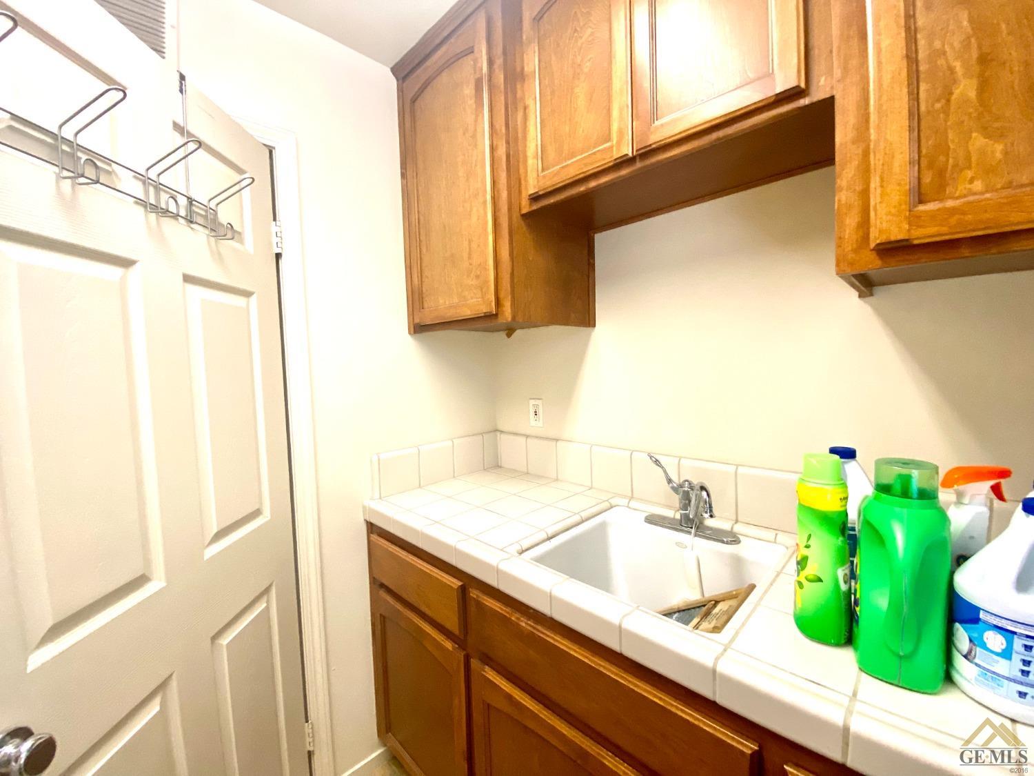 Undisclosed Address Bakersfield, CA 93312 - Photo 12 of 38 a bathroom with a sink and a sink