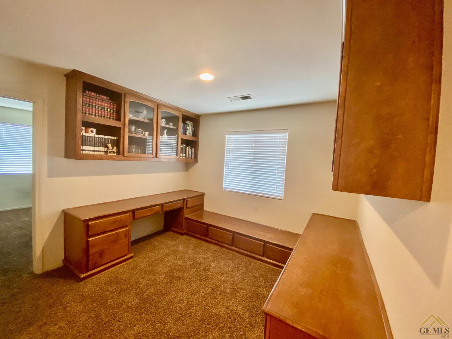 Undisclosed Address Bakersfield, CA 93312 - Photo 13 of 38 a room with furniture and window