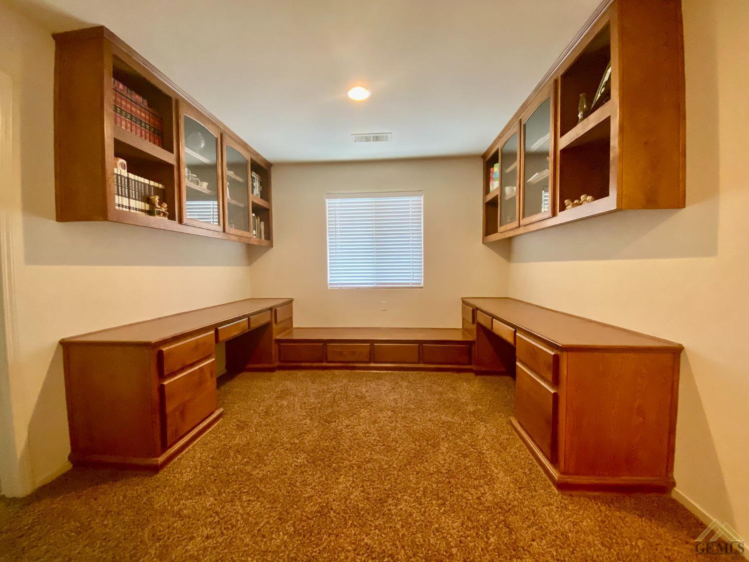 Undisclosed Address Bakersfield, CA 93312 - Photo 14 of 38 a room with furniture and windows