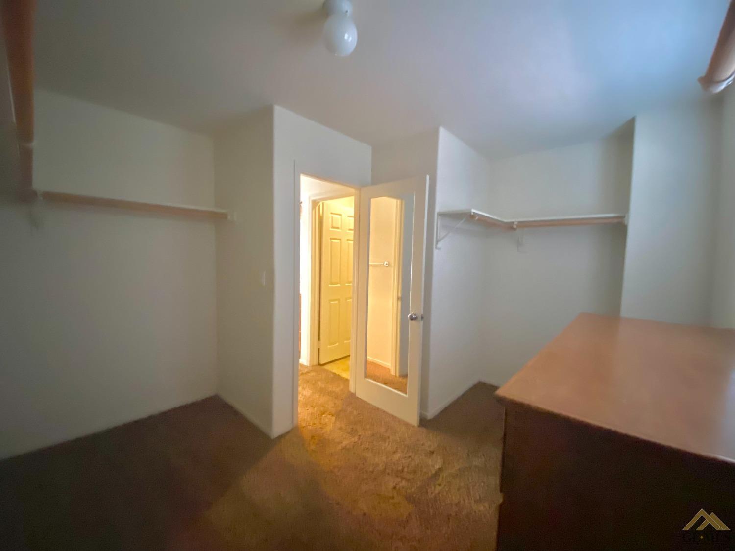 Undisclosed Address Bakersfield, CA 93312 - Photo 22 of 38 a view of an empty room with a window