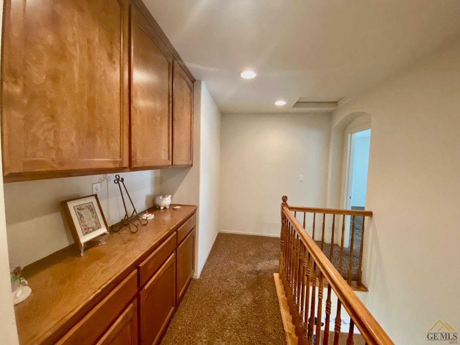 Undisclosed Address Bakersfield, CA 93312 - Photo 30 of 38 a view of a hallway with seating area